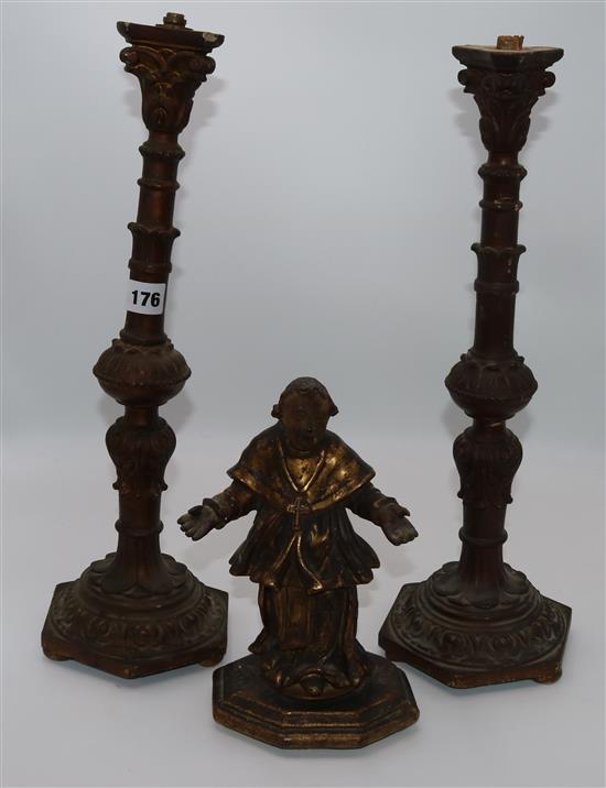 Carved candlesticks & religious figure